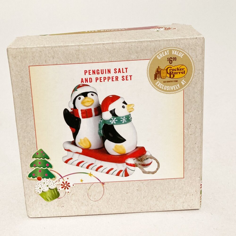 Cracker Barrel Penguin Salt & Pepper Shakers on Peppermint Sled